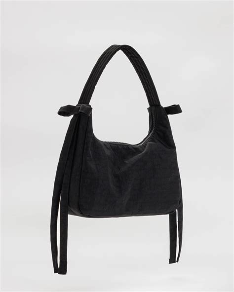 And a new colour in the mini bow bag. . Sandy liang baggu collab